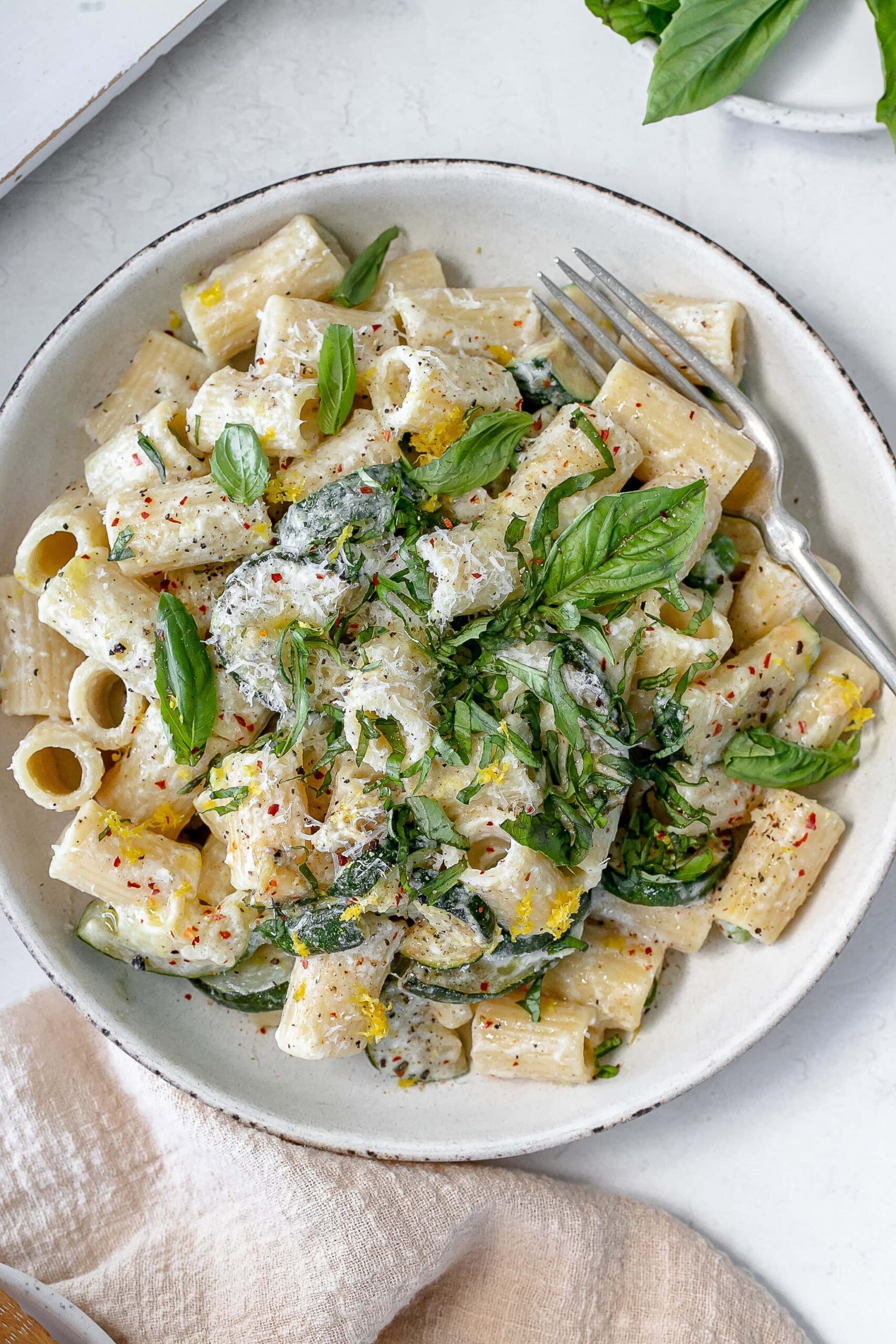 zucchini ricotta pasta in a bowl.