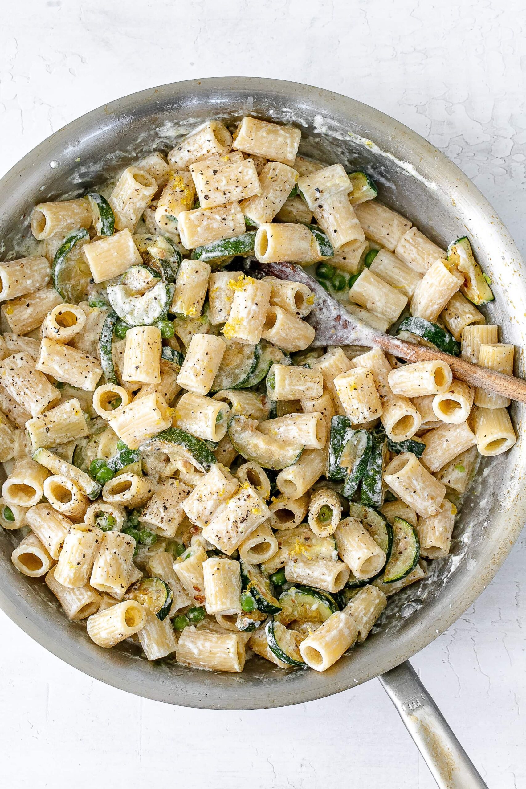 zucchini ricotta pasta in pan.