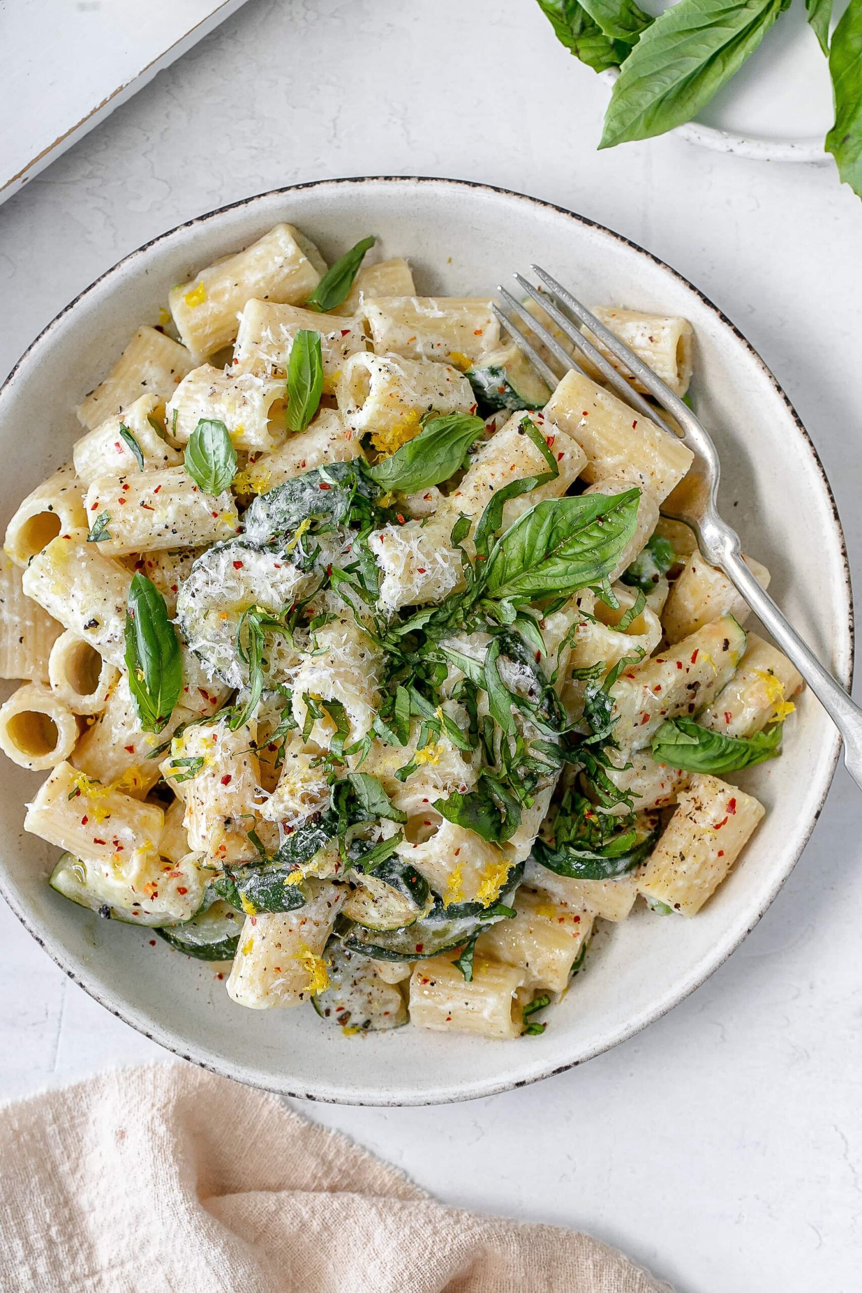 zucchini ricotta pasta in a bowl.