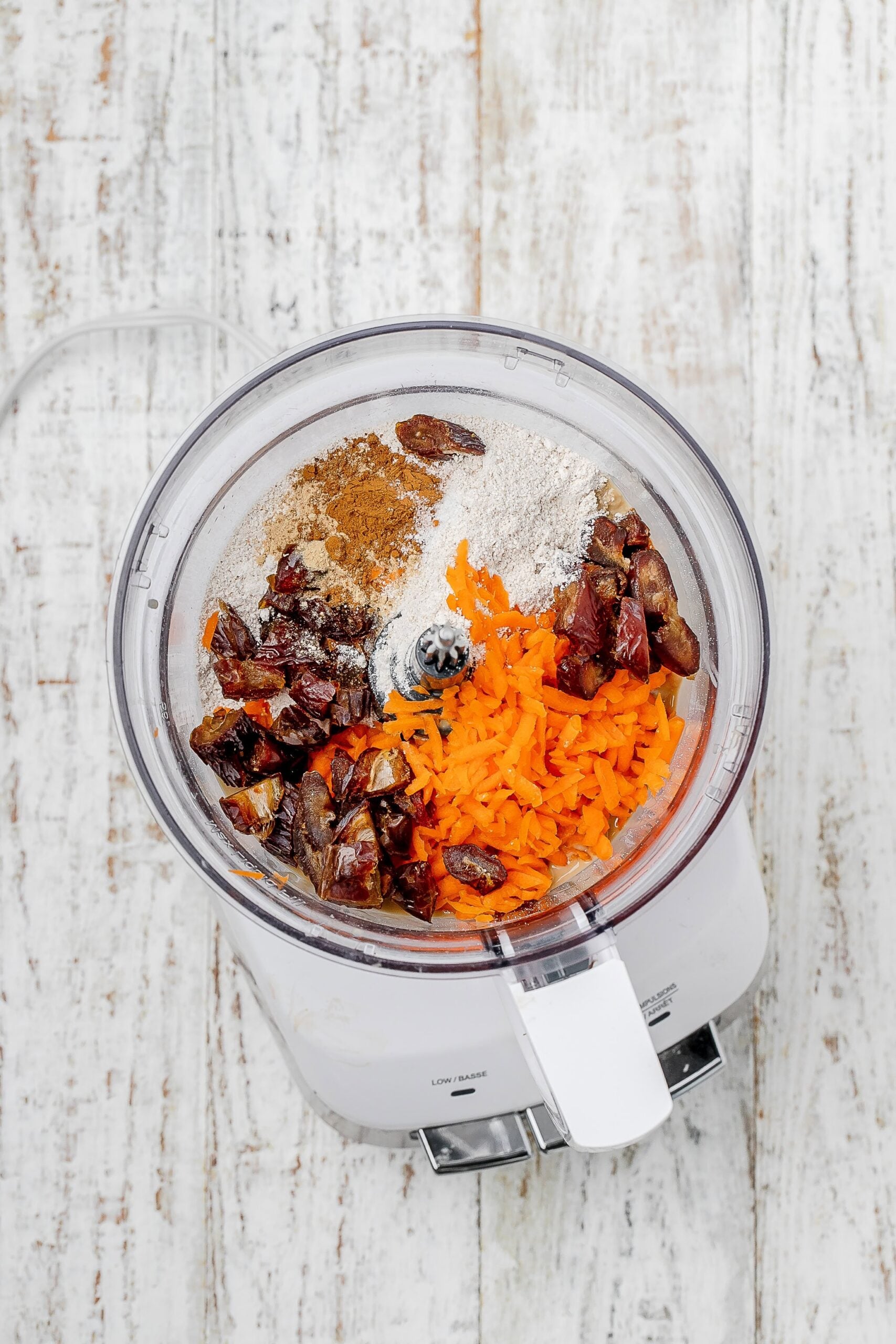 carrot cake ball mixture in a food processor.