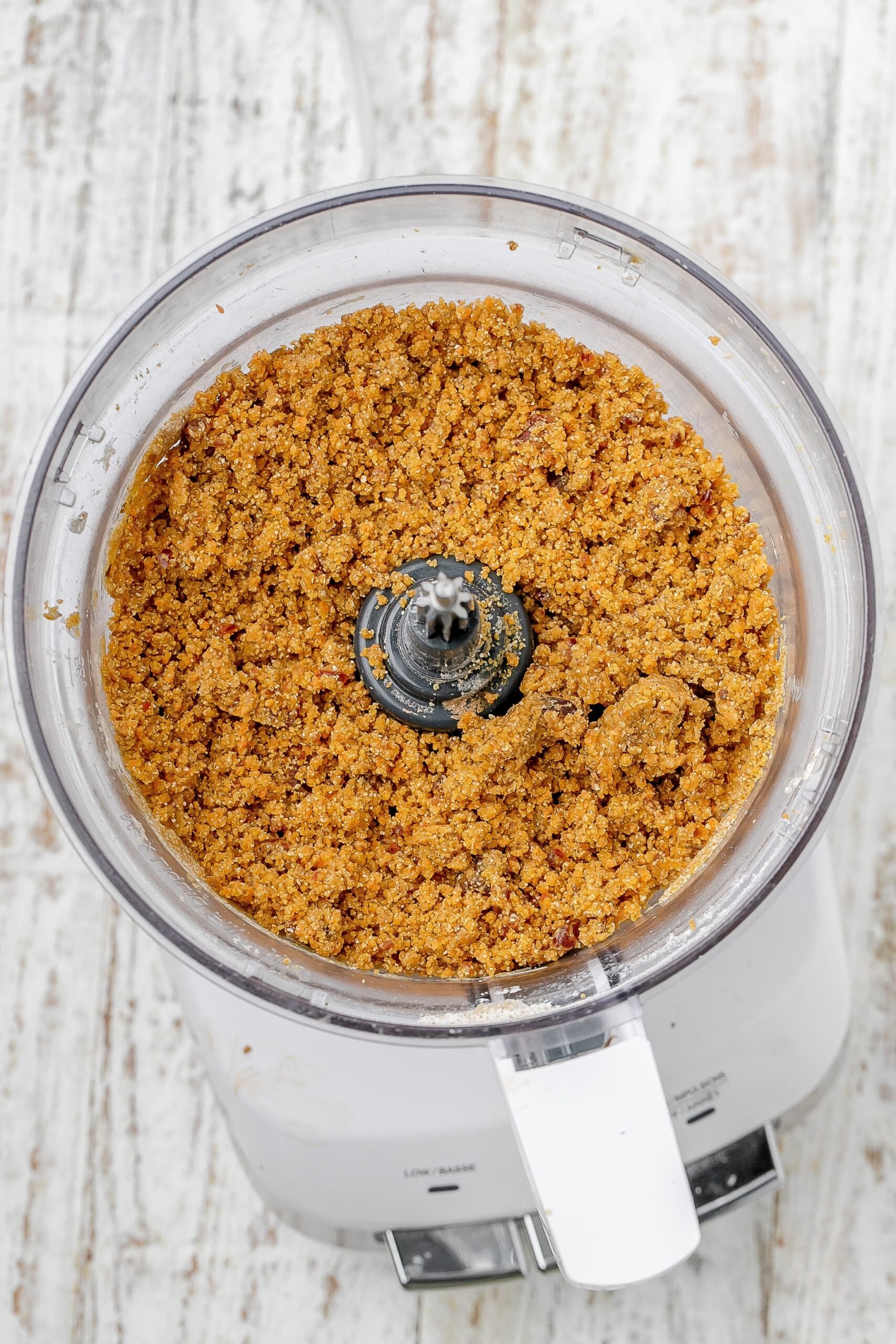 carrot cake ball mixture processed in food processor.