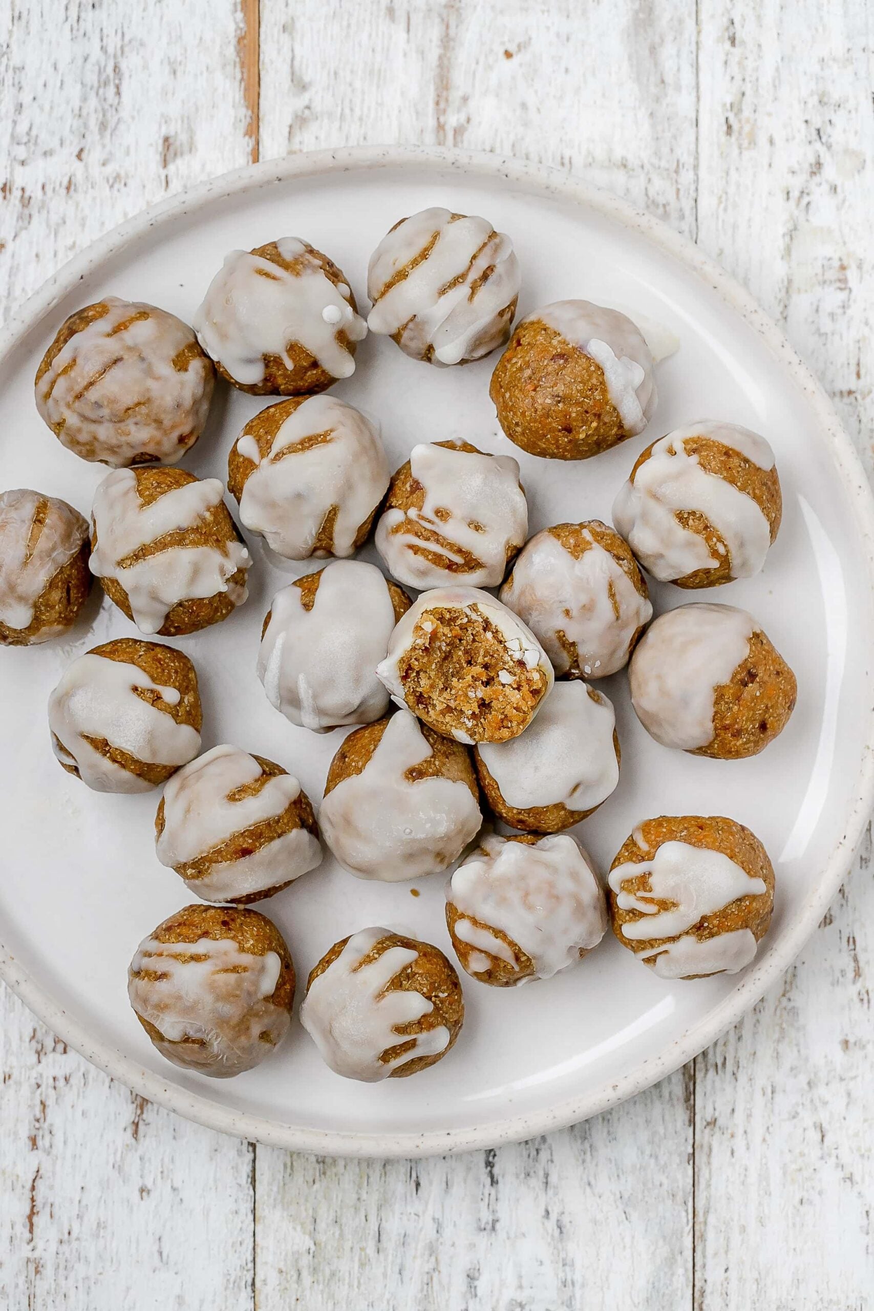 carrot cake bites on a plate.