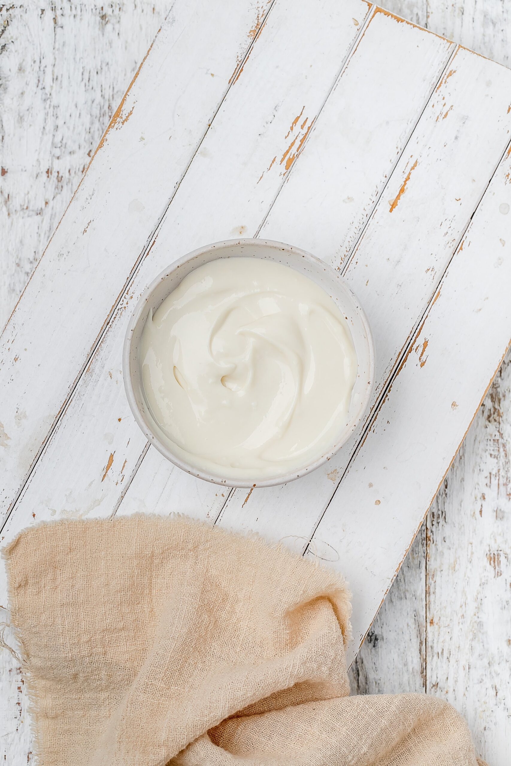 greek yogurt and cream cheese icing in bowl.