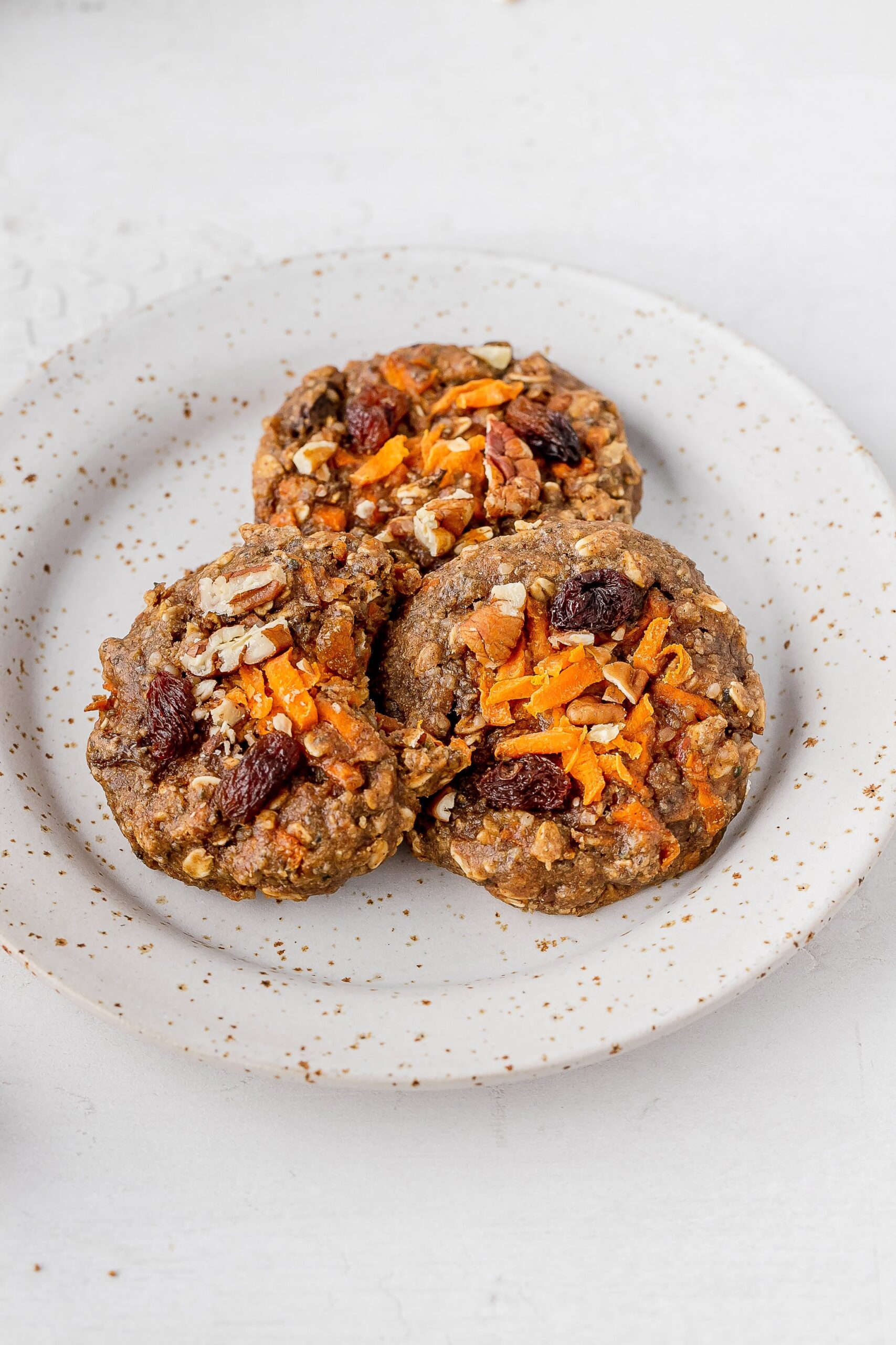 carrot cake breakfast cookies on a plate.