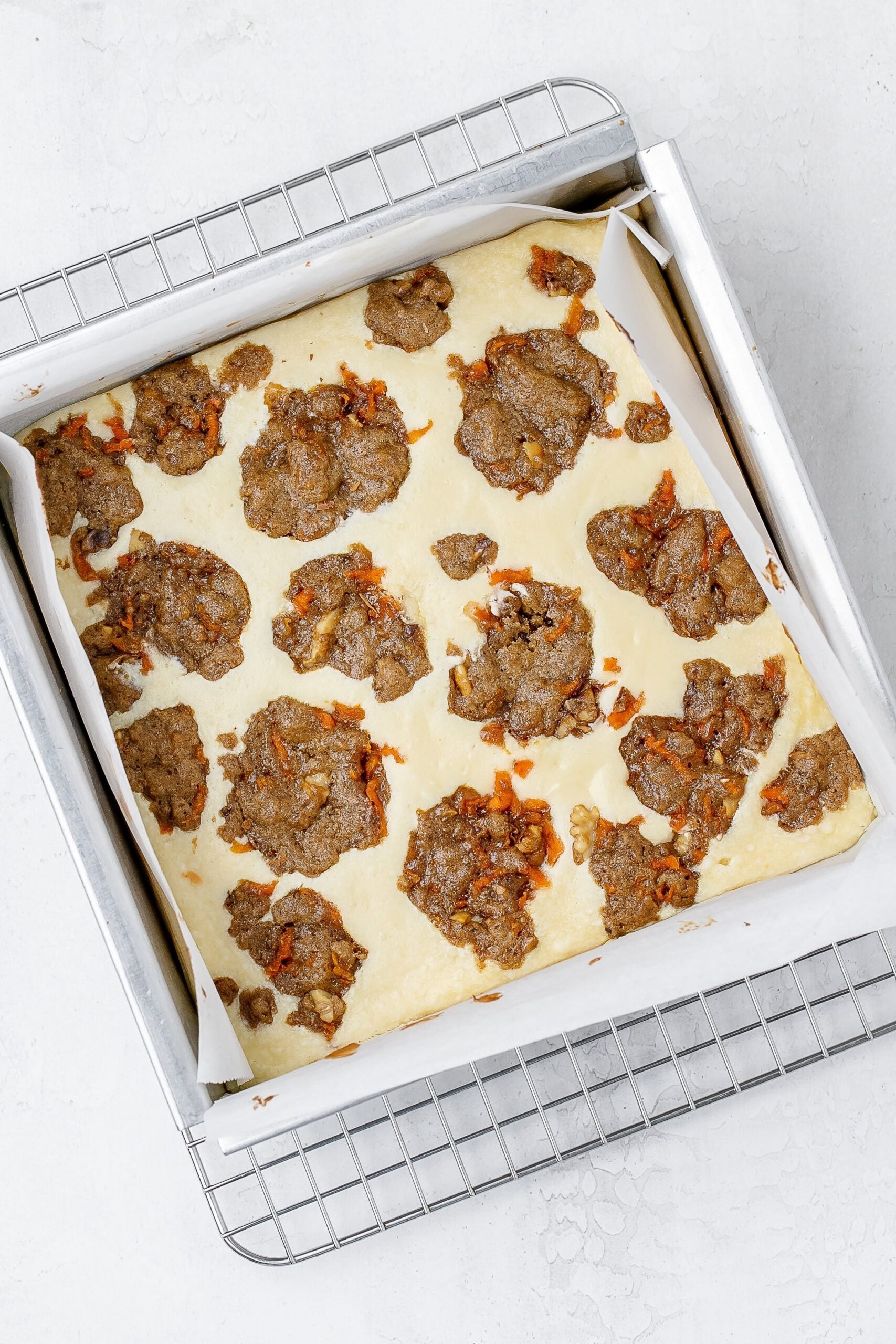 cookie bars cooling on a rack.