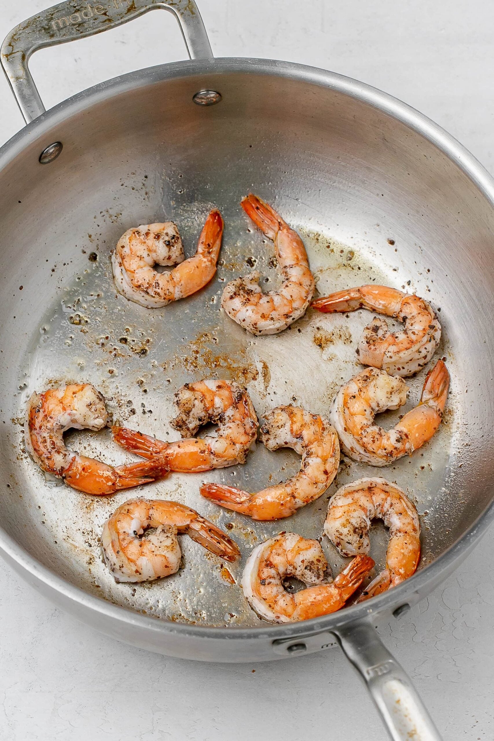 shrimp cooked in skillet.