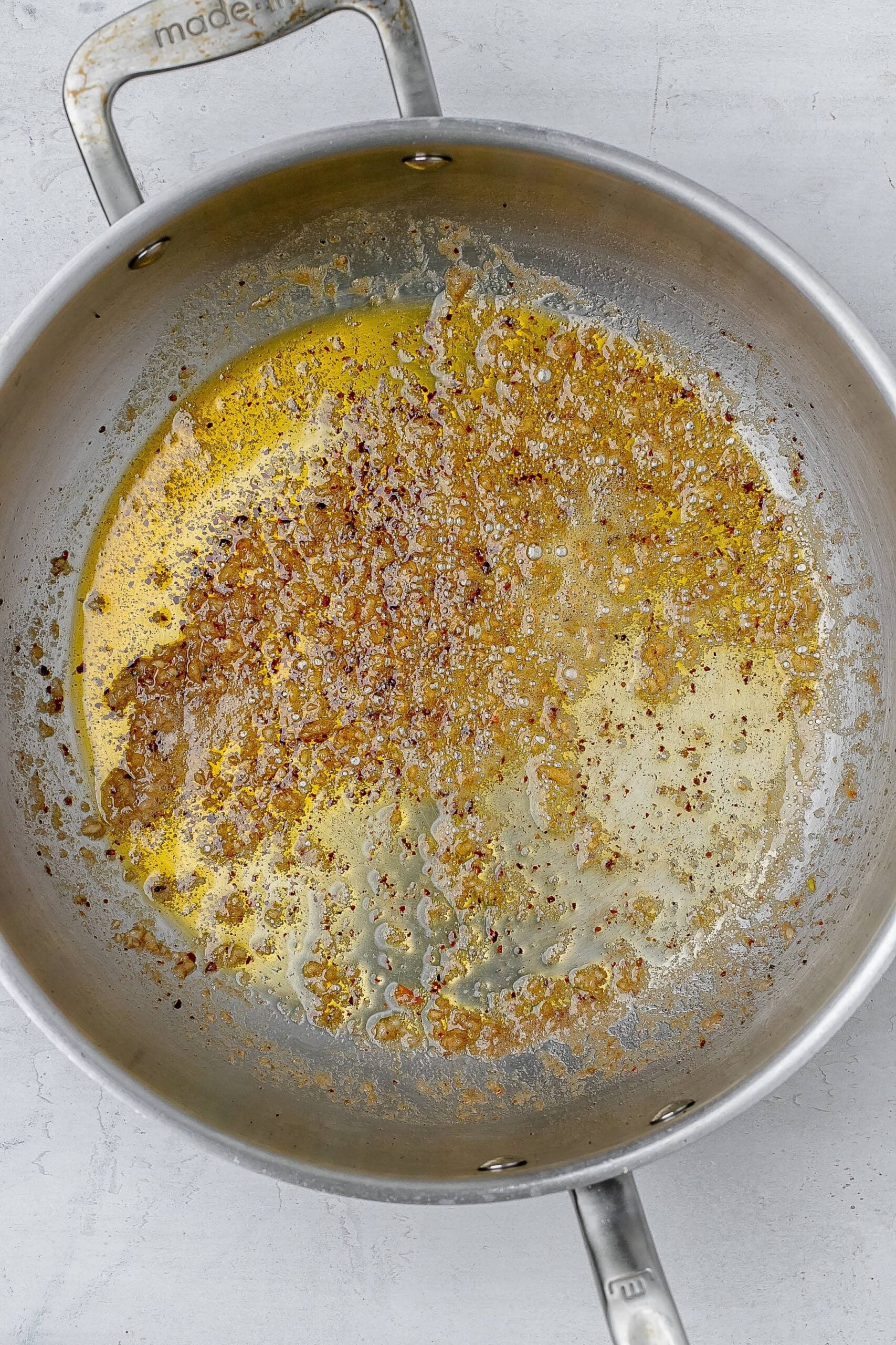 garlic butter sauce in skillet before adding cream.