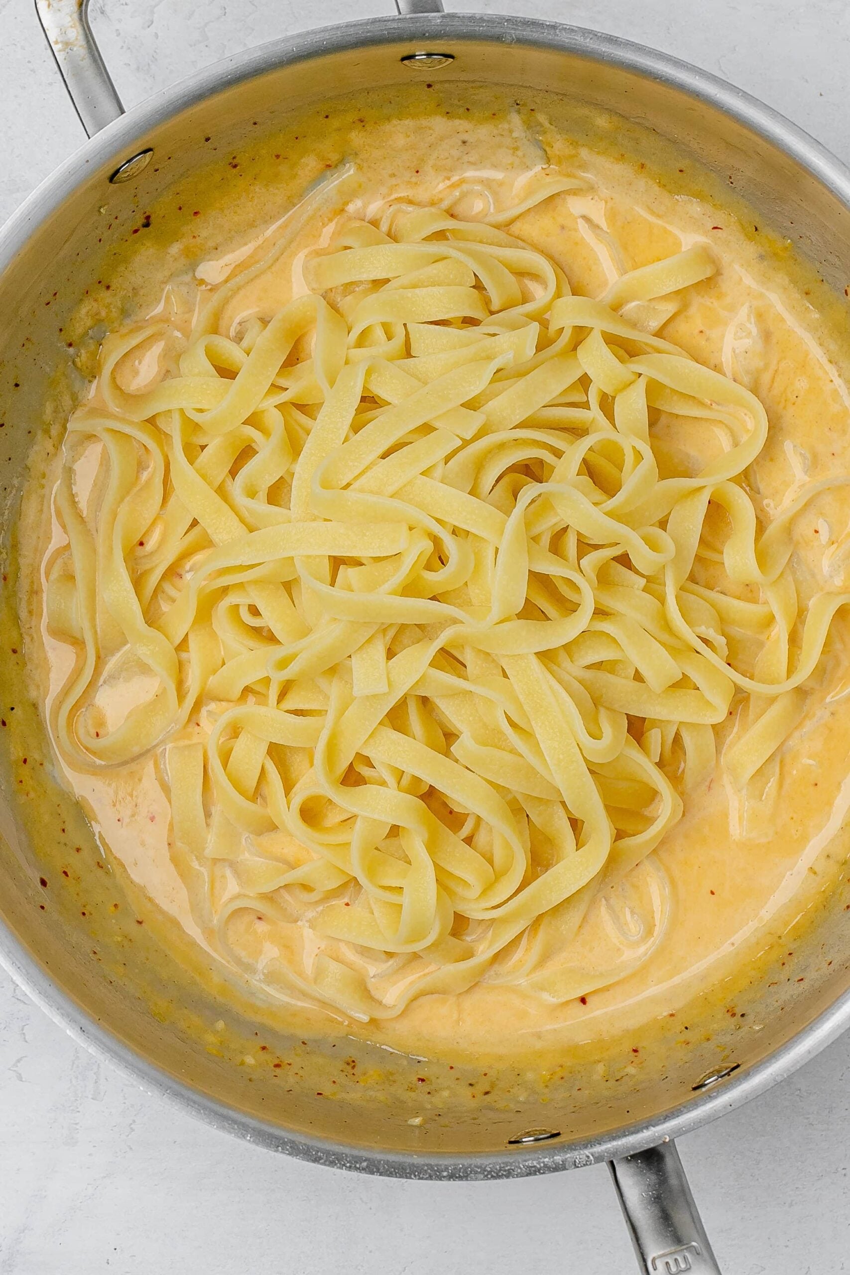 pasta added to cream sauce. 