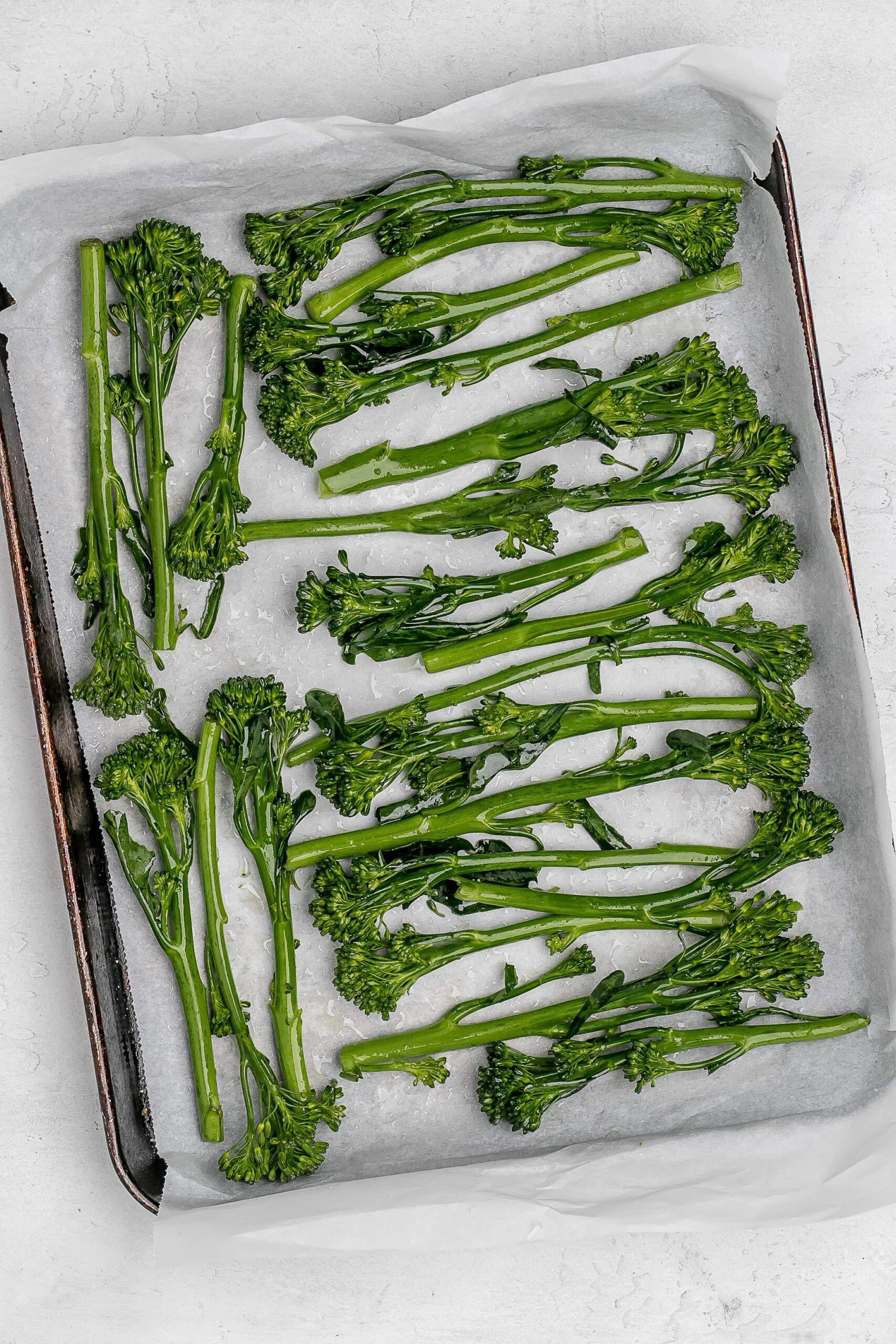 broccolini on baking sheet.