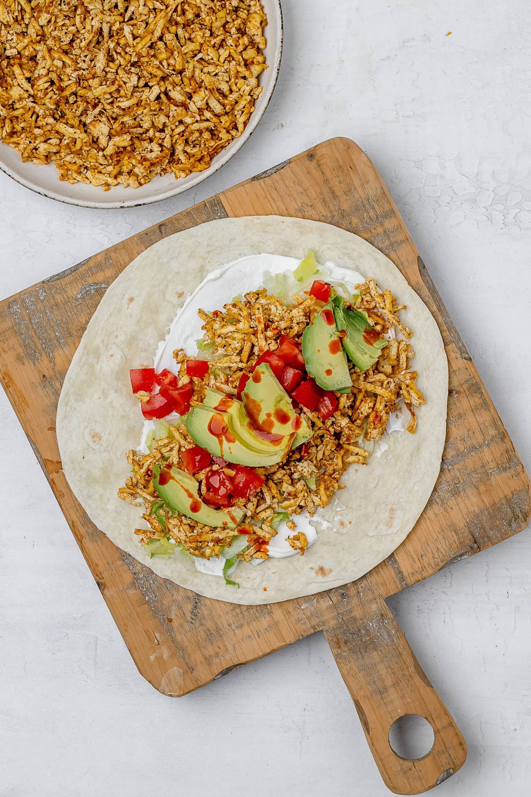 ingredients layered in tortilla.