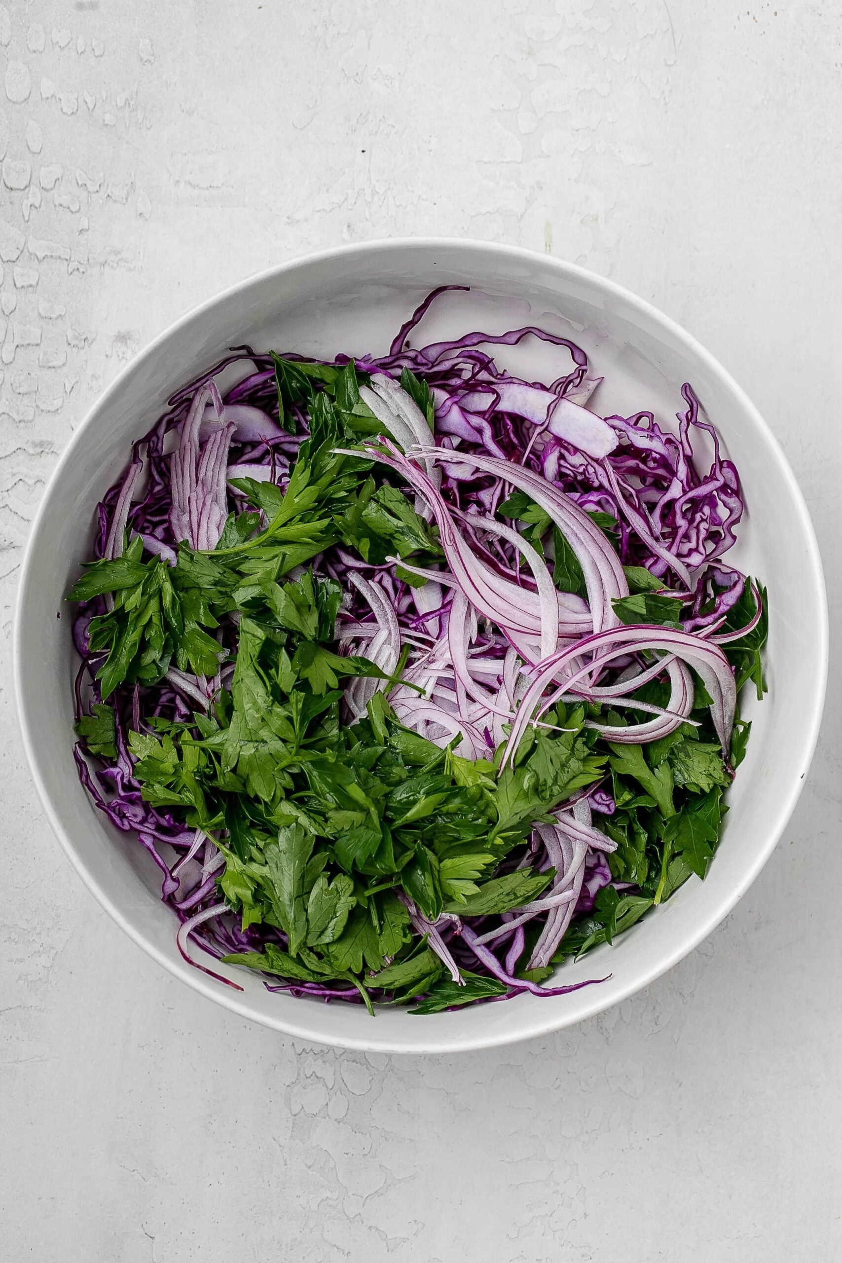 slaw ingredients in a large bowl. 