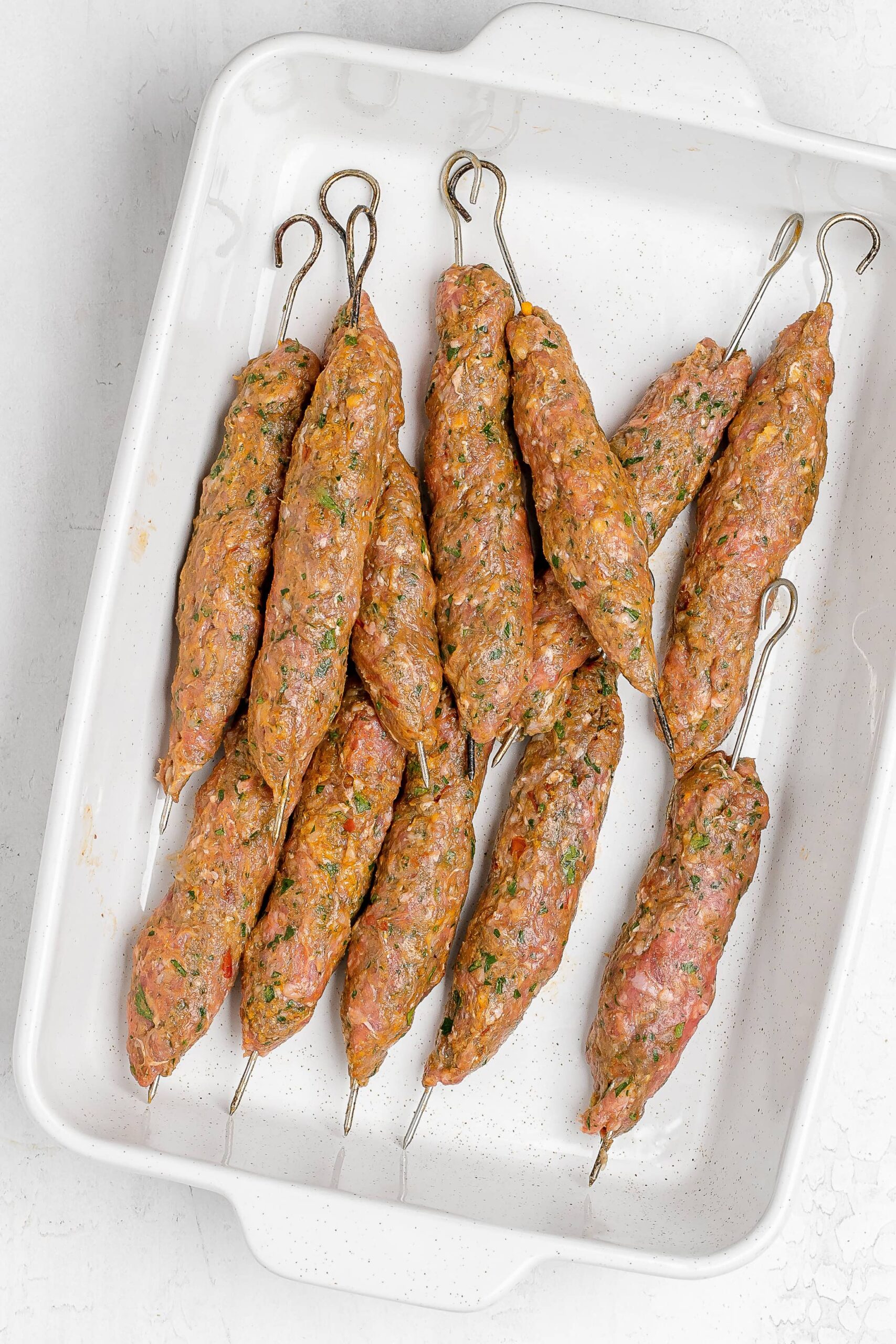 kofta mixture on skewers.