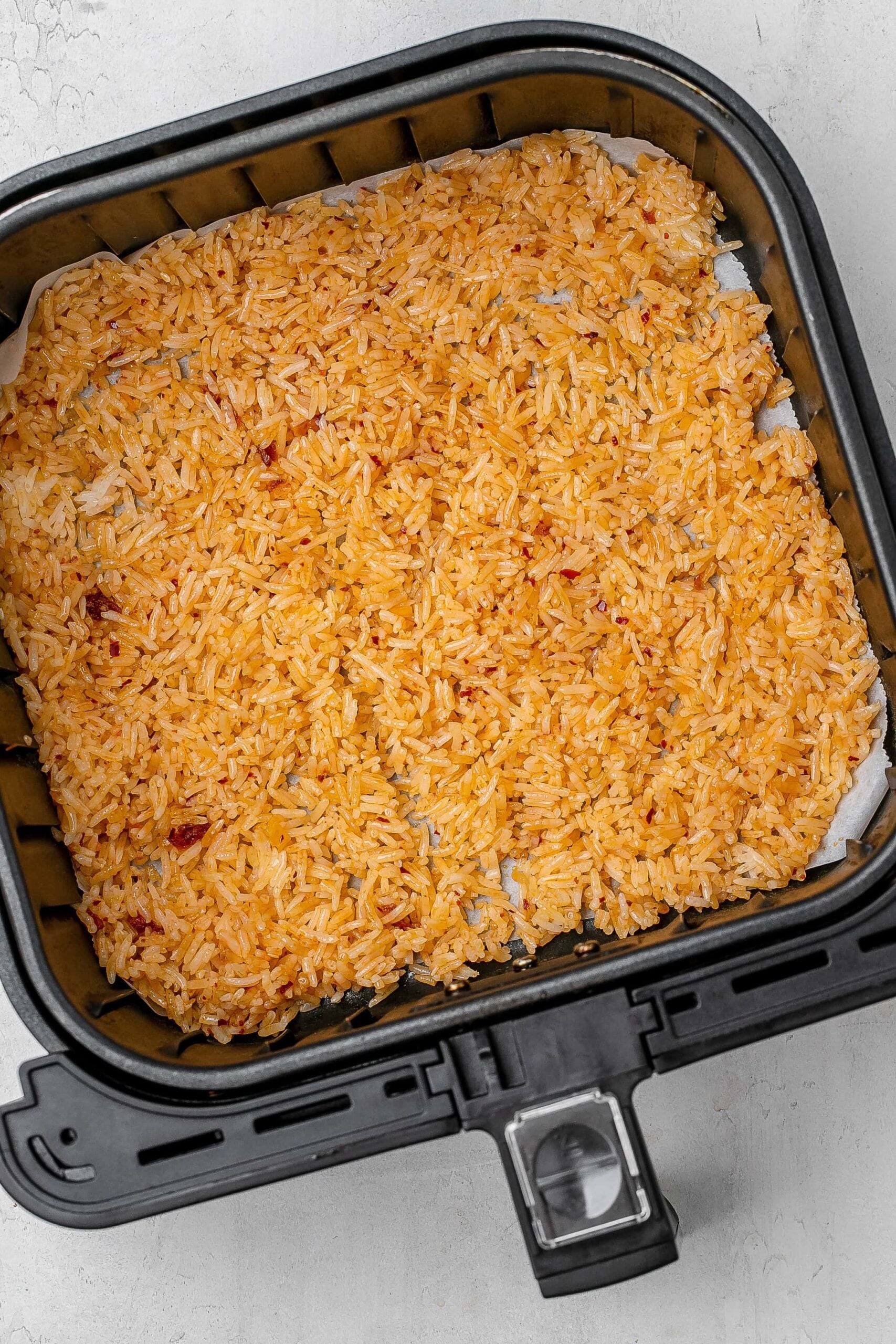 crispy rice in air fryer before being fried.