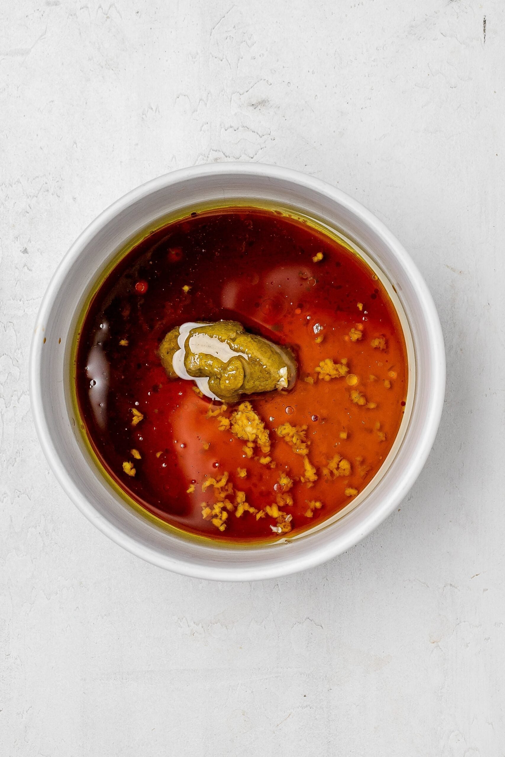 vinaigrette ingredient in a bowl before being whisked.