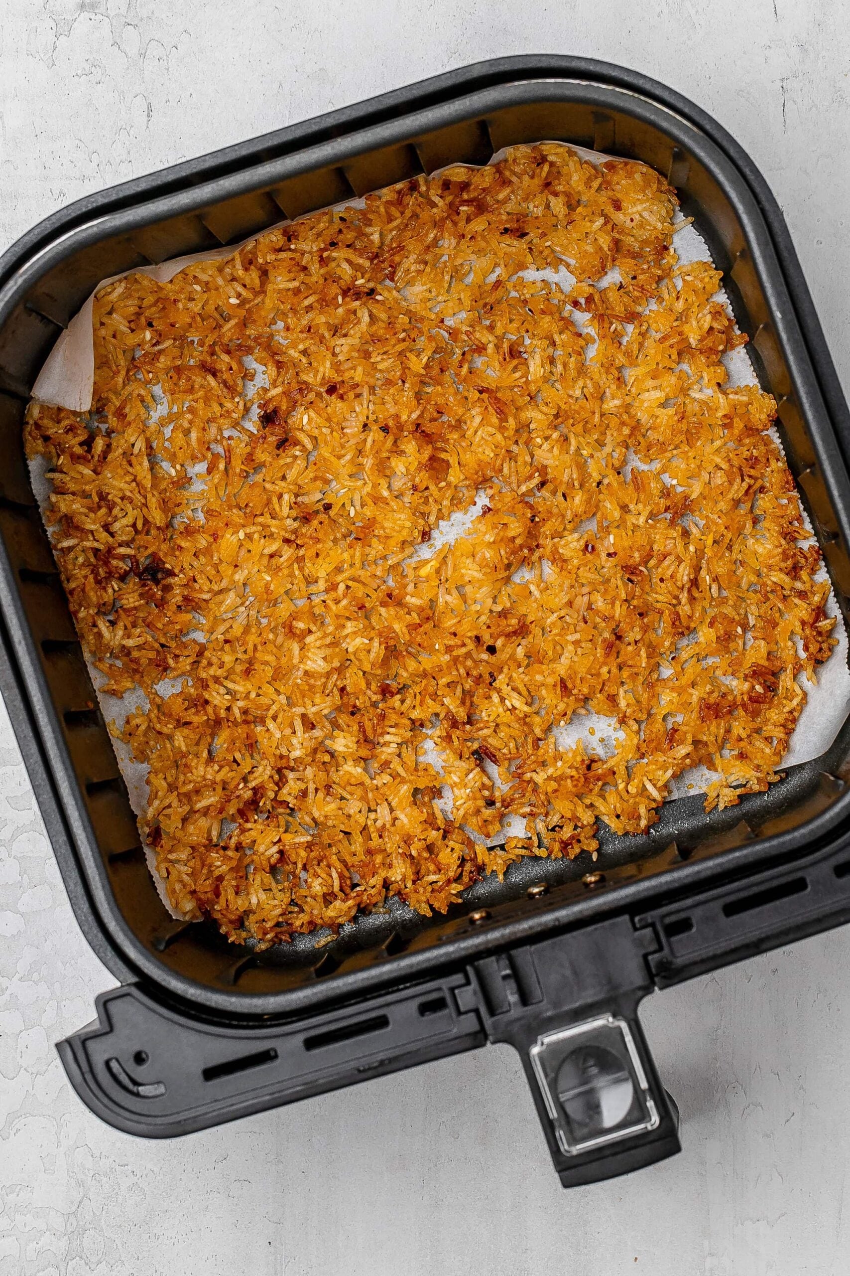 crispy rice in air fryer after being fried. 