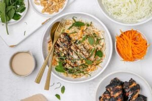 miso cabbage slaw with grilled chicken on top.