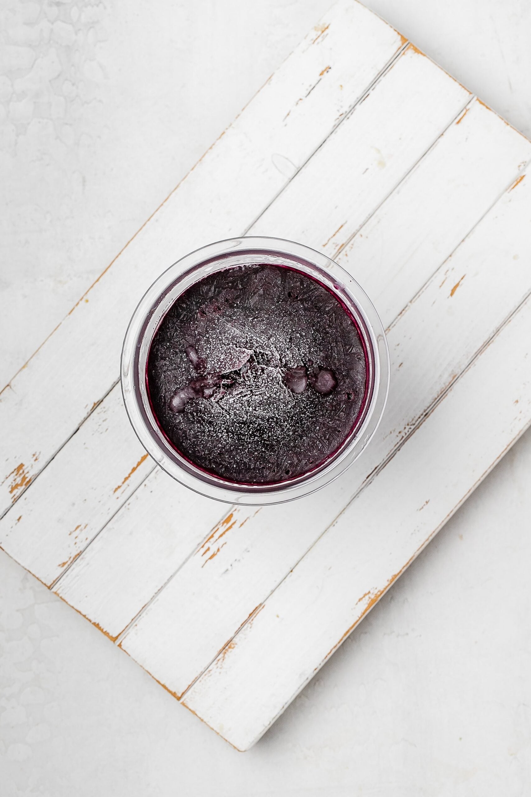 açai mixture in Ninja Creami pint after freezing.