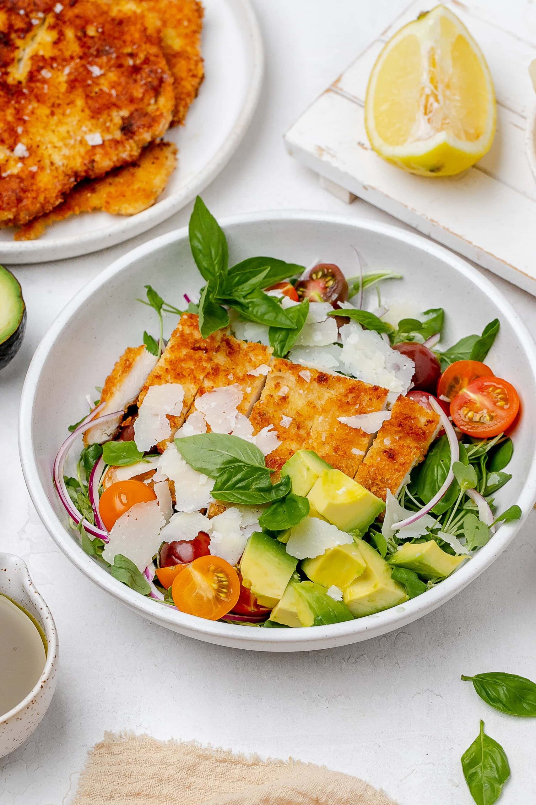 chicken Milanese salad in a bowl.