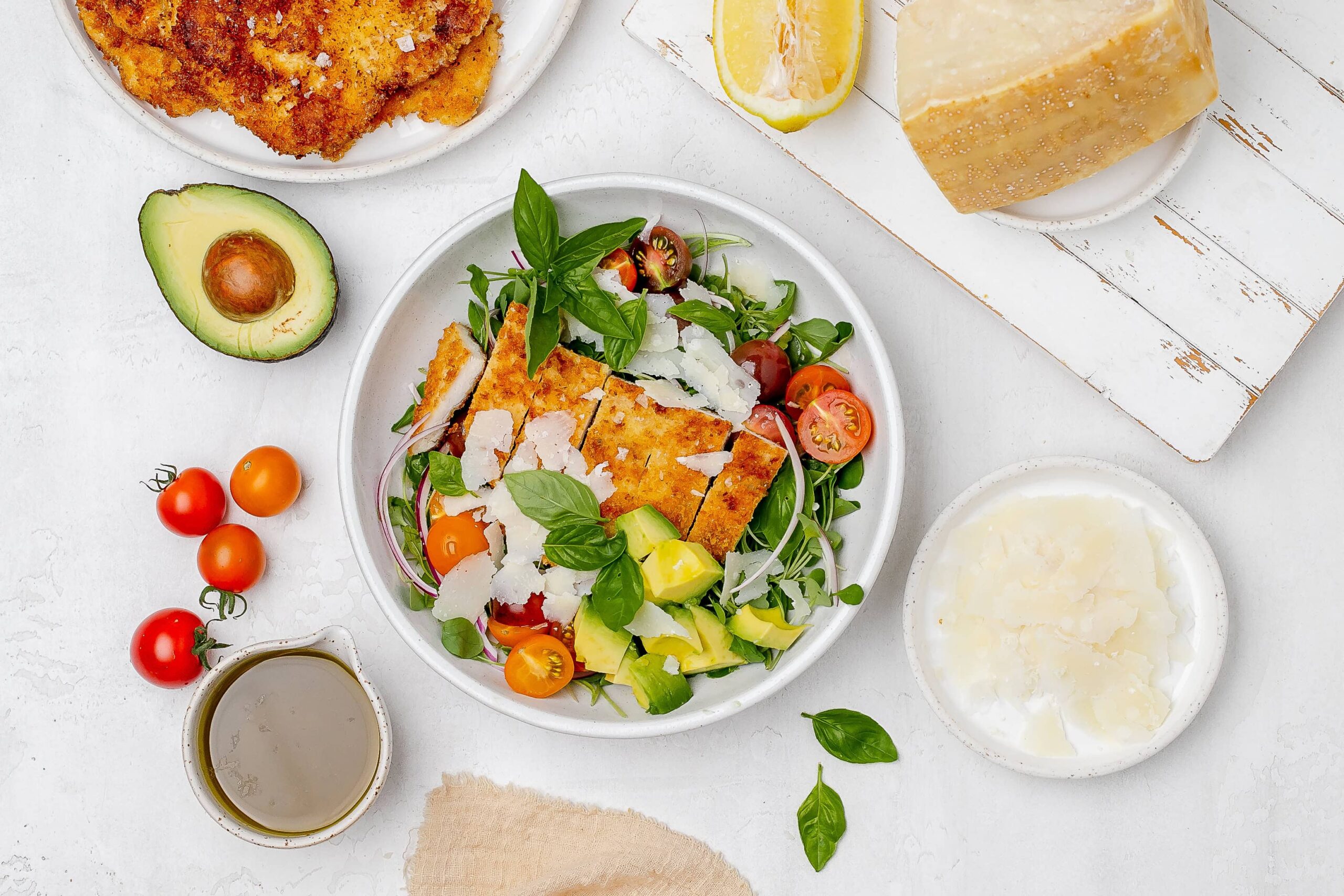 chicken Milanese salad in a bowl.
