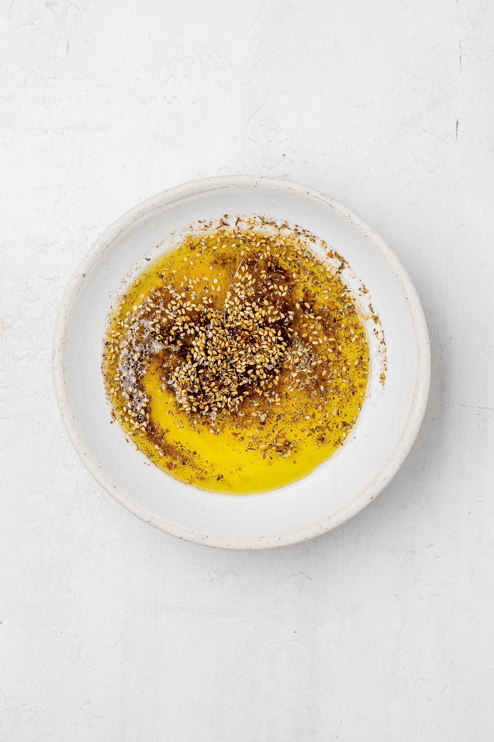 dressing in a bowl before whisking.
