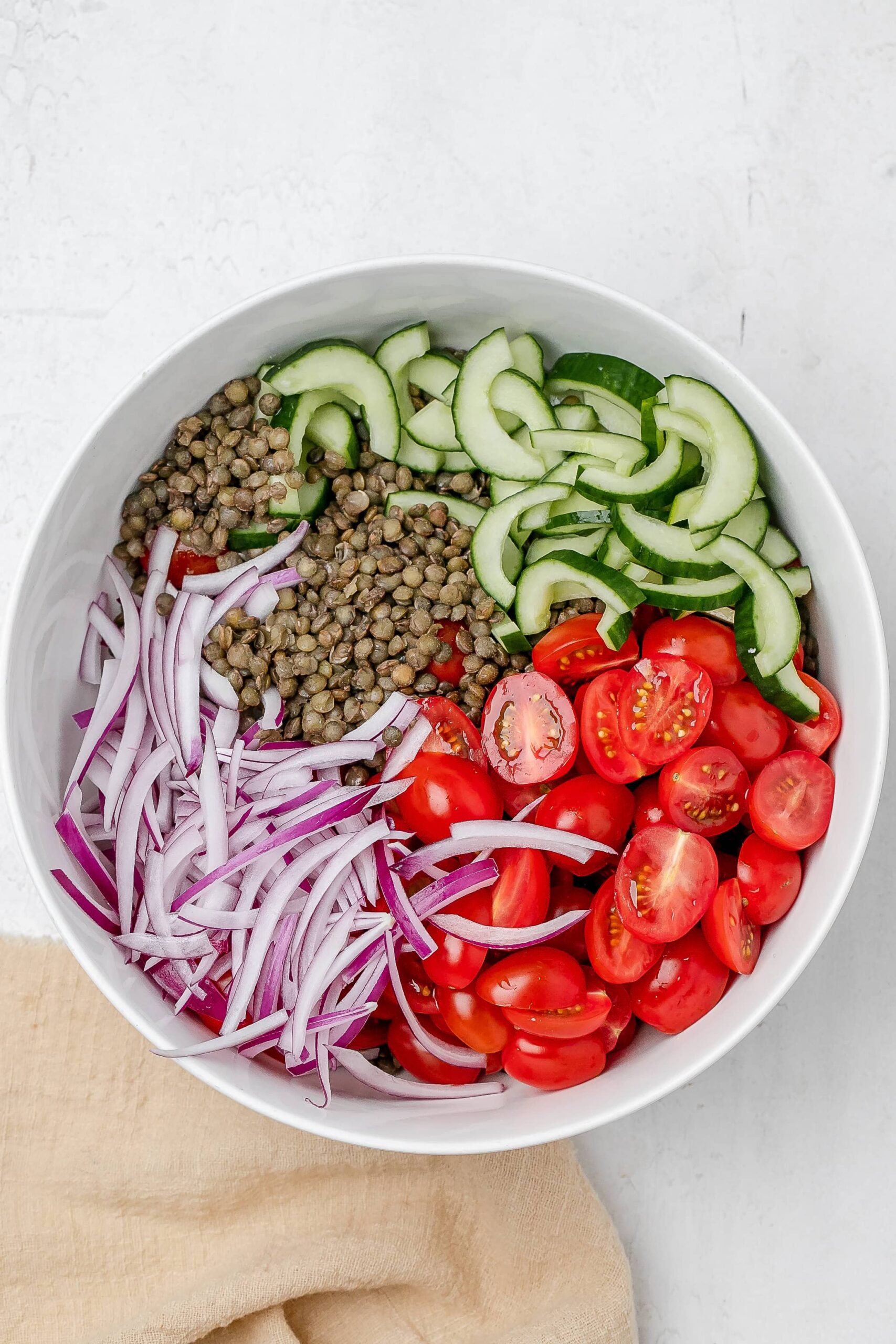 veggies and lentils in a large bowl.